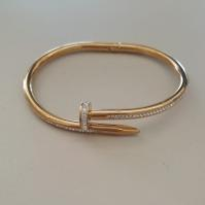BRACELETE AÇO DOURADO PREGO STRASS